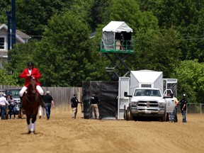 Bob Baffert trained Havnameltdown is taken off the track after being euthanized during the sixth race at Pimlico Race Course on May 20, 2023 in Baltimore, Maryland. (Rob Carr/Getty Images)