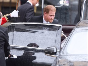 Prince Harry, Duke of Sussex, leaves after King Charles' coronation ceremony, in London, May 6, 2023.