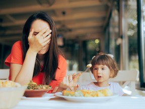 Disobedient toddler in a restaurant