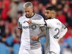 Toronto FC looks to put internal bickering behind it and end a tumultuous week on a winning note as D.C. United comes to town Saturday. Toronto FC's Lorenzo Insigne (right) and Federico Bernardeschi confer over a free kick during action MLS action against New York Red Bulls in Toronto on Wednesday May 17, 2023.THE CANADIAN PRESS/Chris Young