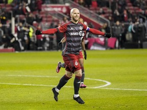 Toronto FC midfielder Michael Bradley (4) celebrates his goal against Charlotte FC during first half MLS soccer action in Toronto, on Saturday, April 1, 2023. The MLS Players Association's release of the 2023 player salary list raised a few questions on the topic of Toronto FC on Tuesday.
