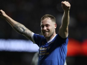 Former Canada captain Scott Arfield is leaving Rangers at the end of the season. Arfield reacts after the Europa League semifinal, second leg, soccer match between Rangers and RB Leipzig at Ibrox Stadium in Glasgow, Scotland, Thursday, May 5, 2022.&ampnbsp;