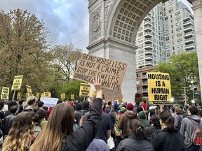 A group of several hundred people protest the death of Jordan Neely, Friday, May 5, 2023, at Washington Square Park in New York.