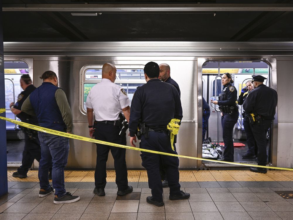 new york police officers respond to the scene where a fight was reported on a subway train, monday, may 1, 2023, in new york.