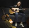 Gordon Lightfoot in dressing room before a show in Oshawa tunes his guitars to perfection --- Veronica Henri photo