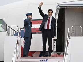 Canadian Prime Minister Justin Trudeau arrives at Hiroshima airport for attending the G7 leaders' summit in Mihara, Hiroshima prefecture,  western Japan May 18, 2023, in this handout photo released by Ministry of Foreign Affairs of Japan. Ministry of Foreign Affairs of Japan/ via REUTERS