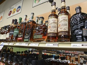 A variety of Bourbon sits on the shelves at an Alcoholic Beverage Control store last year in Dulles, Va.