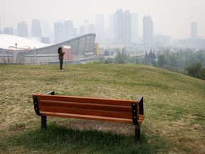 Thick smoke from wildfires blankets the downtown in Calgary