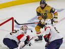 Sergei Bobrovsky of the Florida Panthers makes a save against Mark Stone of the Vegas Golden Knights.