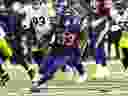 Dalvin Cook of the Minnesota Vikings carries the ball.