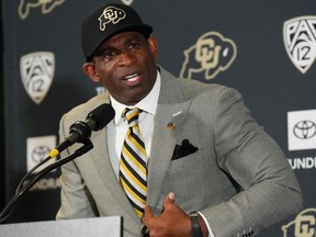 Colorado Buffaloes head coach Deion Sanders speaks during a press conference.