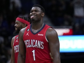 New Orleans Pelicans forward Zion Williamson (1) reacts during a game.
