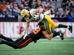 B.C. Lions linebacker Ben Hladik tackles Edmonton Elks wide receiver Vincent Forbes-Mombleau.