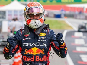Pole position winner Red Bull Racing's Max Verstappen celebrates.