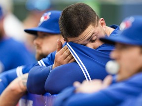 Alek Manoah of the Blue Jays wipes his brow in the dugout after getting pulled in the first inning against the Houston Astros on June 5,