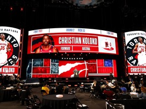 A general view as deputy commissioner Mark Tatum announces Christian Koloko as the 33rd pick by the Toronto Raptors during the 2022 NBA Draft at Barclays Center on June 23, 2022 in New York City.