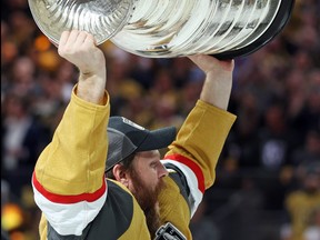 Phil Kessel of the Vegas Golden Knights hoists the Stanley Cup.