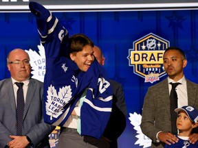 Easton Cowan is all smiles after being selected by the Toronto Maple Leafs.