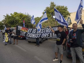 Israeli activists protest against the government's judicial overhaul bill