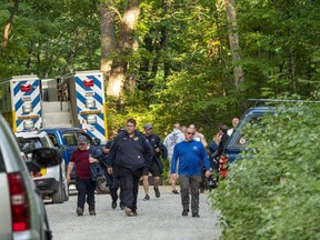 Search and rescue teams leave the command post at St. Mary's Wilderness