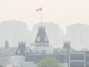 Smoke from wildfires burning across both Ontario and Quebec blanket the skyline in Kingston