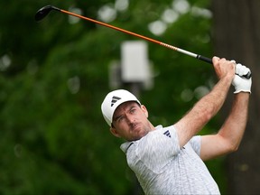 Nick Taylor, of Canada, tees off at the 18th hole during the final round at the Canadian Open championship in Toronto on Sunday, June 11, 2023.
