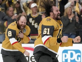 Vegas Golden Knights' Mark Stone, right, celebrates along with right wing Phil Kessel after they defeated the Florida Panthers 9-3 to win the Stanley Cup in Game 5 of the NHL hockey Stanley Cup Finals Tuesday, June 13, 2023, in Las Vegas.