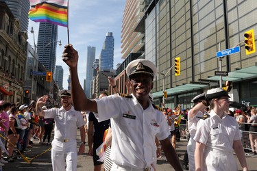 Members of the Royal Canadian Navy walk in the Toronto Pride Parade.