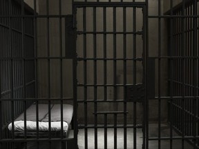 An empty jail cell is pictured