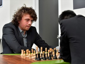 In this file photo taken Oct. 6, 2022, grandmaster Hans Niemann waits his turn to move during a second-round chess game against Jeffery Xiong in St. Louis.
