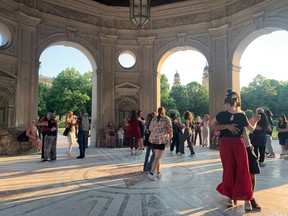 Dancers underneath Diana's Temple.