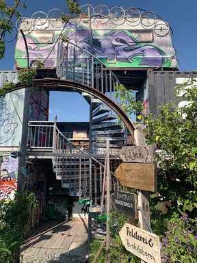 Arts colony in a former slaughterhouse area that re-purposes transit vehicles.