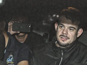 Dutch Joran Van der Sloot is transferred in a police car from the Ancon I jail in Lima, on June 8, 2023