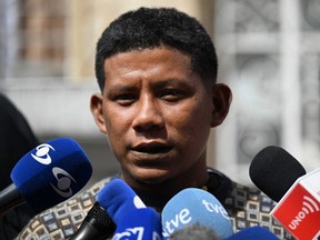 Manuel Ranoque, father of two of the four Indigenous children who were found alive after being lost for 40 days in the Colombian Amazon rainforest following a plane crash, speaks with the press in Bogota, Sunday, June 11, 2023.