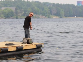 Peter Brown tries his luck at fishing at the boat launch at Ramsey Lake in Sudbury, Ont., June 5, 2023.