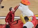 Conor McGregor knocks out the Miami Heat's mascot on June 9, 2023.
