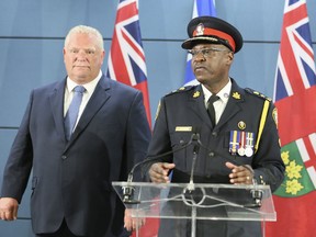 Toronto Police Chief Mark Saunders with Premier Doug Ford talk funding for new closed circuit cameras on Friday August 23, 2019.