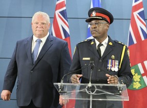 Toronto Police Chief Mark Saunders with Premier Doug Ford talk funding for new closed circuit cameras on Friday August 23, 2019.
