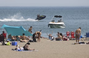 People take in the hot weather at Woodbine Beach in Toronto on Friday June 2, 2023. Jack Boland/Toronto Sun