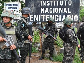 Honduran soldiers guard the facilities of the Women's Center