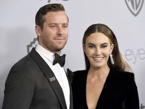 Armie Hammer, left, and wife Elizabeth Chambers arrive at the InStyle and Warner Bros. Golden Globes afterparty, Jan. 7, 2018, in Beverly Hills, Calif. Hammer has reached a divorce agreement with Chambers, nearly three years after she filed to end their marriage. Hammer's attorney filed documents in Los Angeles Superior Court on Tuesday, June 20, 2023, informing a judge that the actor and Chambers have come to terms over child custody, child support, spousal support and division of assets.
