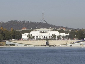 Australia's Parliament House sits behind Lake Burley Griffin.