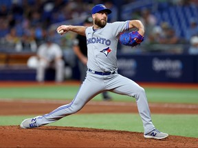 Anthony Bass of the Blue Jays pitches during the seventh inning against the Tampa Bay Rays at Tropicana Field on May 22, 2023 in St Petersburg.