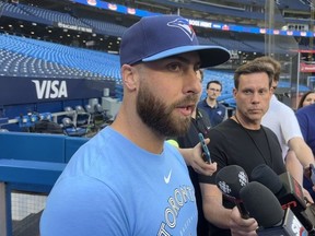 Blue Jays pitcher Anthony Bass talks to reporters on May 30.