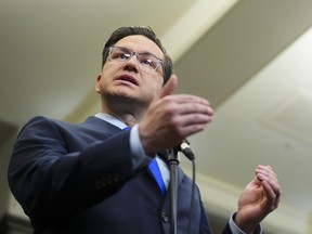 Conservative Leader Pierre Poilievre speaks to reporters in the foyer of the House of Commons on Parliament Hill in Ottawa on Thursday, June 8, 2023.