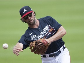 Atlanta Braves' Charlie Culberson throws to first.
