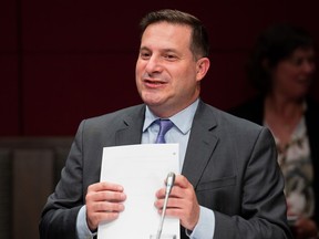 Public Safety Minister Marco Mendicino waits to appear at a committee.