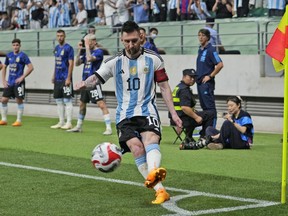 Argentina's Lionel Messi takes a corner kick during the friendly soccer match against Australia at the Workers' Stadium in Beijing, China, Thursday, June 15, 2023.
