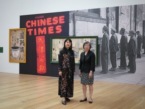 Chinese Canadian Museum CEO Dr. Melissa Karmen Lee, left, and board chair Grace Wong