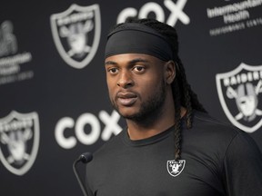 Las Vegas Raiders wide receiver Davante Adams speaks during a news conference at the NFL football team's training facility